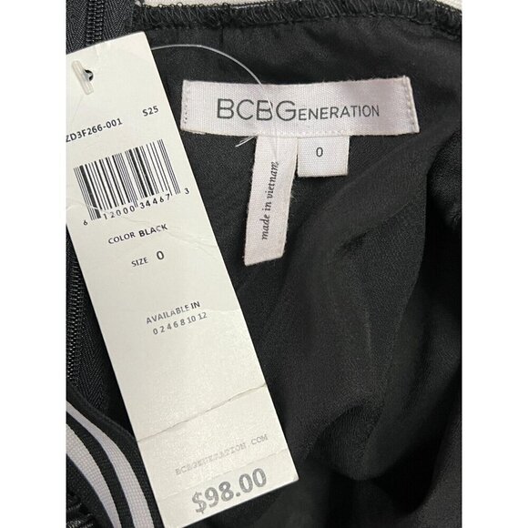 BCBGeneration Mini Skirt Size 0 Black Shine Lasercut Eyelet Back Zip NWT - Picture 6 of 10